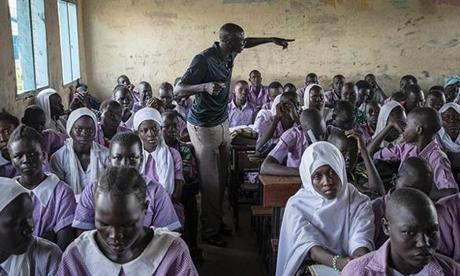 Kakuma, Kenya - 5/11/2018 - Teacher Kuku Kurimagi Agoumi, a refugee from South Sudan and a student of SNHU's online degree program, leads his class in study at a school at the UNHCR refugee camp in Kakuma, Kenya, May 11, 2018. Teaching is one of the few jobs refugees are authorized to hold in the camp. Established in 1992 following the arrival the 
