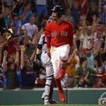 Boston, MA - 7/27/2018 - (10th inning) Boston Red Sox right fielder Mookie Betts (50) dances as he watches his game winning home run in the tenth inning leave the park. The Boston Red Sox host the Minnesota Twins in the second of a four game series at Fenway Park. - (Barry Chin/Globe Staff), Section: Sports, Reporter: Peter Abraham, Topic: 28Red Sox-Twins, LOID: 8.4.2664046326.