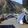 People displaced by the earthquake took refuge in tents Monday.