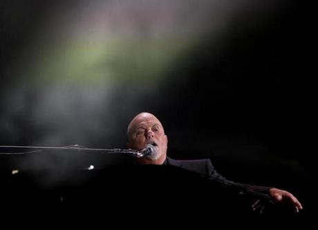Billy Joel performs at Fenway Park.
