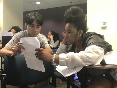 Clinton Nguyen (left) and Baja Beaman went over a draft during a Teens In Print class at Emerson College.
