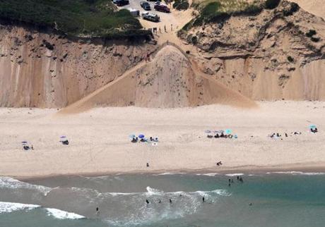 Swimmers at Long Nook Beach in Truro on Thursday, where William Lytton was bit by a shark Wednesday. 
