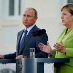 Russia?s Vladimir Putin (left) and Germany?s Angela Merkel spoke with the media prior to their joint talks near Berlin.