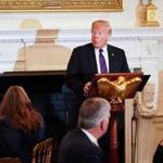 (FILES) In this file photo taken on August 27, 2018 US President Donald Trump speaks at an event honouring Evangelical leadership in the State Dining Room of the White House in Washington, DC. - US President Donald Trump warned evangelical leaders that if Republicans lose control of Congress in the midterm elections, Democrats will institute change 