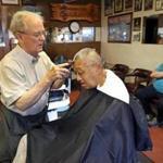 Since he was a young boy, William Young, 67, has been getting his hair cut by Joseph Monahan.