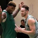 Marcus Smart (left) and Gordon Hayward share a light moment at practice. 