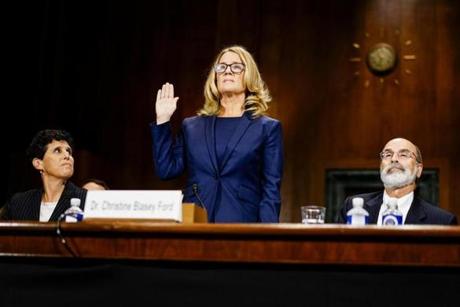 WASHINGTON, DC - SEPTEMBER 27: Christine Blasey Ford swears in at a Senate Judiciary Committee hearing in the Dirksen Senate Office Building on Capitol Hill September 27, 2018 in Washington, DC. A professor at Palo Alto University and a research psychologist at the Stanford University School of Medicine, Ford has accused Supreme Court nominee Judge Brett Kavanaugh of sexually assaulting her during a party in 1982 when they were high school students in suburban Maryland. (Photo by Melina Mara-Pool/Getty Images)
