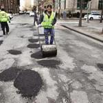 Bound together with plastic polymers, asphalt will be cheaper and last longer than conventional pavement, experts say.