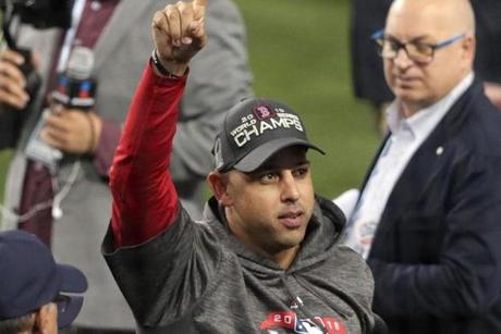 Los Angeles, CA - 10/28/2018 - Alex Cora points skyward as the Red Sox celebrate winning the World Series. The Los Angeles Dodgers host the Boston Red Sox in Game 5 of the World Series at Dodger Stadium. (Barry Chin/Globe staff)
