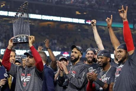 Los Angeles, CA - 10/28/2018 - David Price, Christian Vazquez and Chris Sale celebrate after The Red Sox win the World Series. The Los Angeles Dodgers host the Boston Red Sox in Game 5 of the World Series at Dodger Stadium. (Stan Grossfeld/Globe staff)
