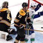 Boston, MA - 11/08/2018 - (2nd period) Vancouver Canucks left wing Loui Eriksson (21) celebrates after the Canucks scored during the second period. Boston Bruins goaltender Jaroslav Halak (41) was pulled from the game shortly after. The Boston Bruins host the Vancouver Canucks at TD Garden. - (Barry Chin/Globe Staff), Section: Sports, Reporter: Matt Porter, Topic: 09Bruins-Canucks, LOID: 8.4.3749033466.