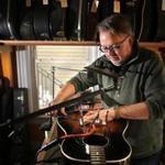 Somerville, MA - 10/25/18 - Stubblebine begins a repair. Bob Stubblebine (cq) is one of the area's top guitar luthiers, people who not only keep guitars playable but form a small community of craftsmen who help, teach, and learn from each other in the ages-old, hands-on tradition. He is the owner of Stubblebine Lutherie near Davis Square. (Lane Turner/Globe Staff) Reporter: (Jose Martinez) Topic: (25zoluthier)