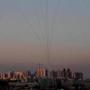 Missiles from Israel's Iron Dome air defense system in the south of Israel destroyed incoming missiles fired at Israel from the Palestinian enclave of Gaza above Ashkelon on Tuesday. A rocket launched by a Gaza militant hit an apartment in Ashkelon early Tuesday, killing one and critically wounding another.