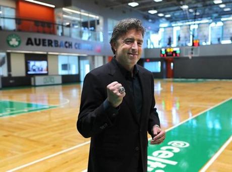 Brighton- 06/19/18- Boston Celtics CEO Wyc Grousbeck pumps his fist with a Celtics championship ring on his finger as he walks across the new court , as the Boston Celtics held a grand opening of their new practice facilty, the Auerbach Center on Guest Street. Photo by John Tlumacki/Globe Staff(lmetro)
