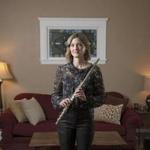 Elizabeth Rowe, the Boston Symphony Orchestra's principal flutist, at her home in Boston in November.  