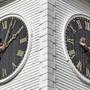 Brothers David G. Hochstrasser and Ross A. Hochstrasser work on the clock at the New North Church in Hingham. 