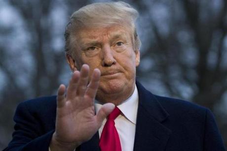 President Donald Trump waves after speaking with the media after stepping off Marine One on the South Lawn of the White House, Sunday, March 24, 2019, in Washington. The Justice Department said Sunday that special counsel Robert Mueller's investigation did not find evidence that President Donald Trump's campaign 