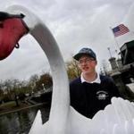 BOSTON, MA - April 13, 2019: Swan Boat captain Jack Barden pedals his boat away from the dock at the Public Garden in Boston, MA on April 13, 2019. The Paget Family's Swan Boats returned to the Lagoon for the 143rd season. (Craig F. Walker/Globe Staff) section: Metro reporter: