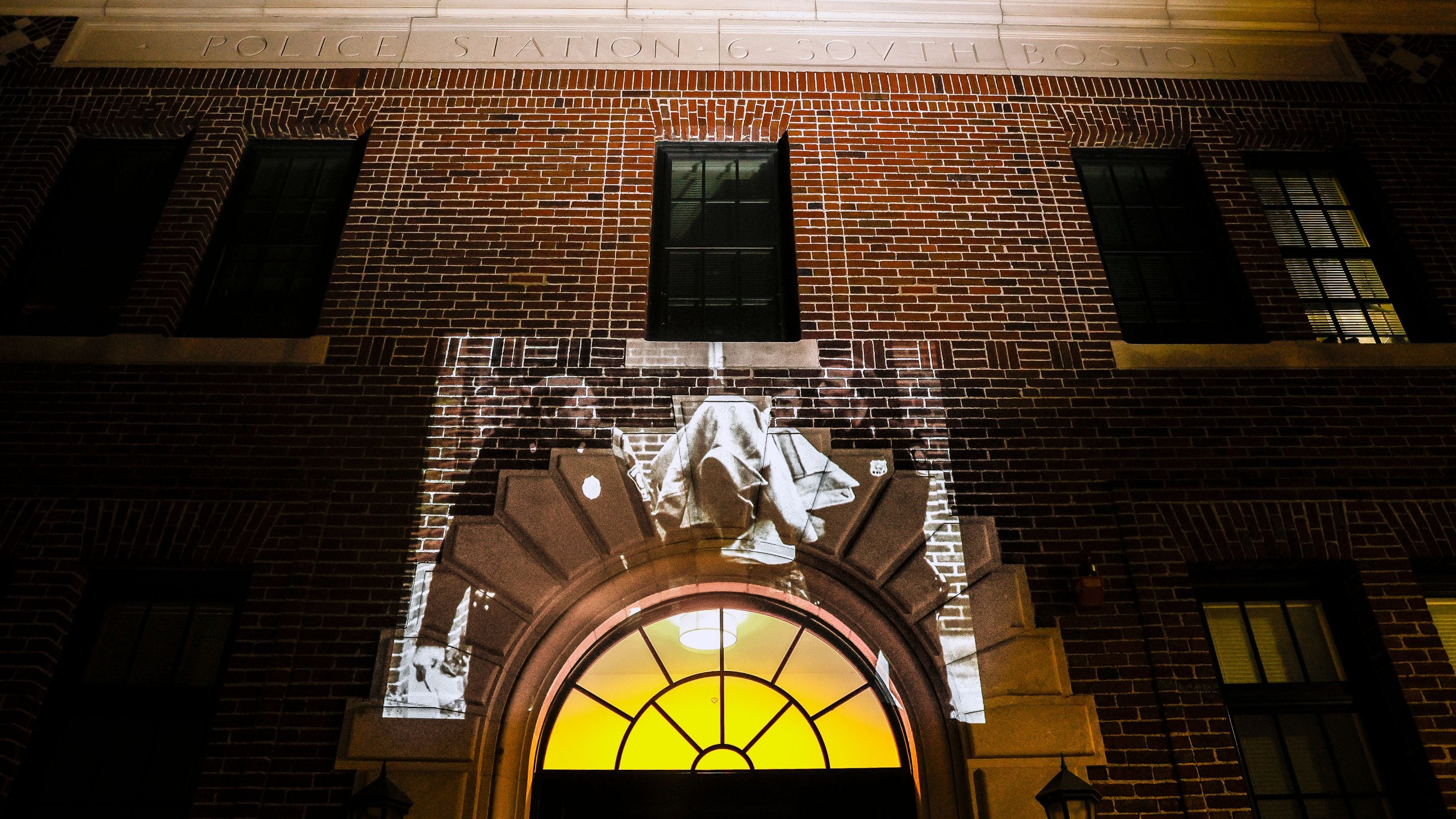 A photo projected on the former Boston Police Department’s homicide unit in South Boston.