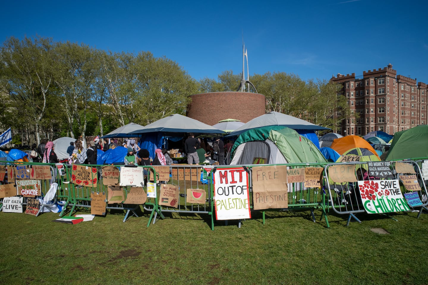 Signs and flags are pictured at a pro-Palestinian encampment on the lawn of the Stratton Student Center campus at the Massachusetts Institute of Technology in May.