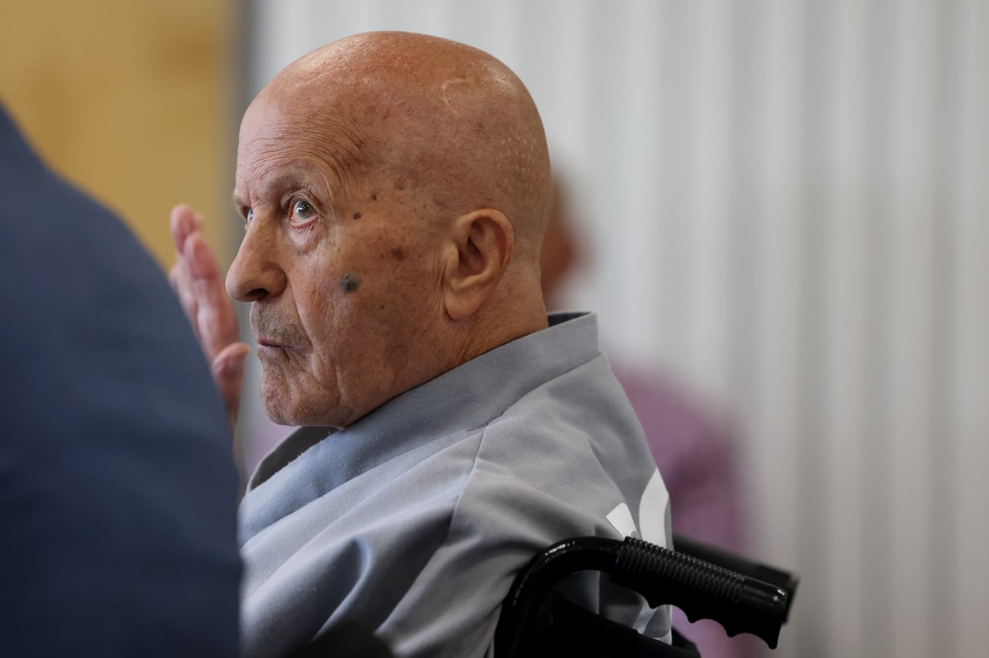 Nicola Colafella, who this spring pleaded guilty to a double murder after his case had languished for 34 years, raised his hand to swear in during a parole hearing Thursday.