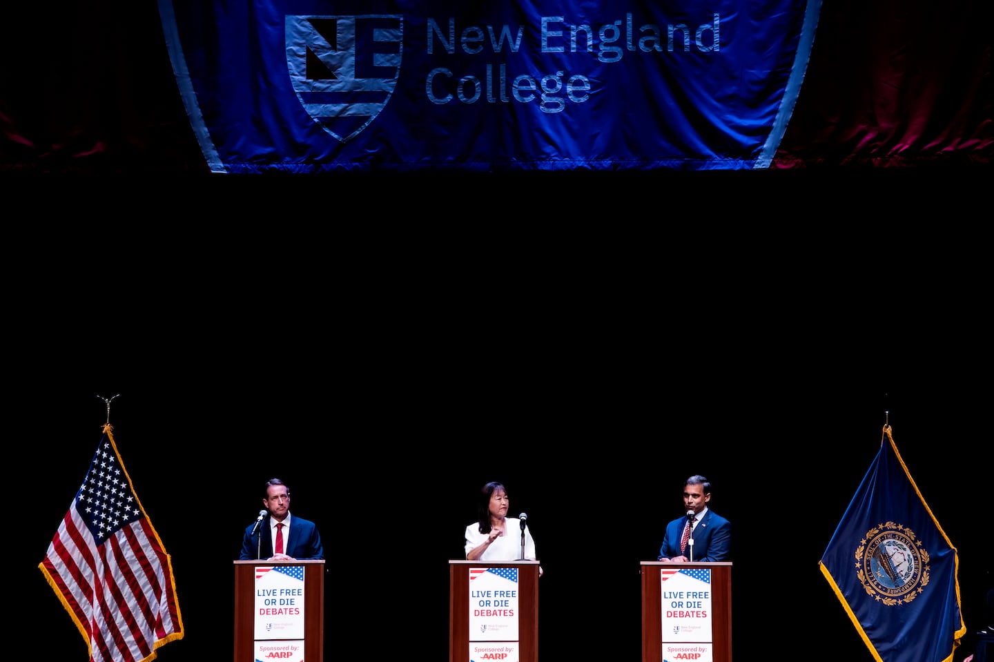 Republican candidates William Hamlen, from left, Lily Tang Williams and Vikram Mansharamani at the GOP primary debate for New Hampshire's 2nd Congressional District on the campus of New England College in Henniker, N.H., on Wednesday, Sept. 4, 2024. (Geoff Forester/The Concord Monitor via AP)