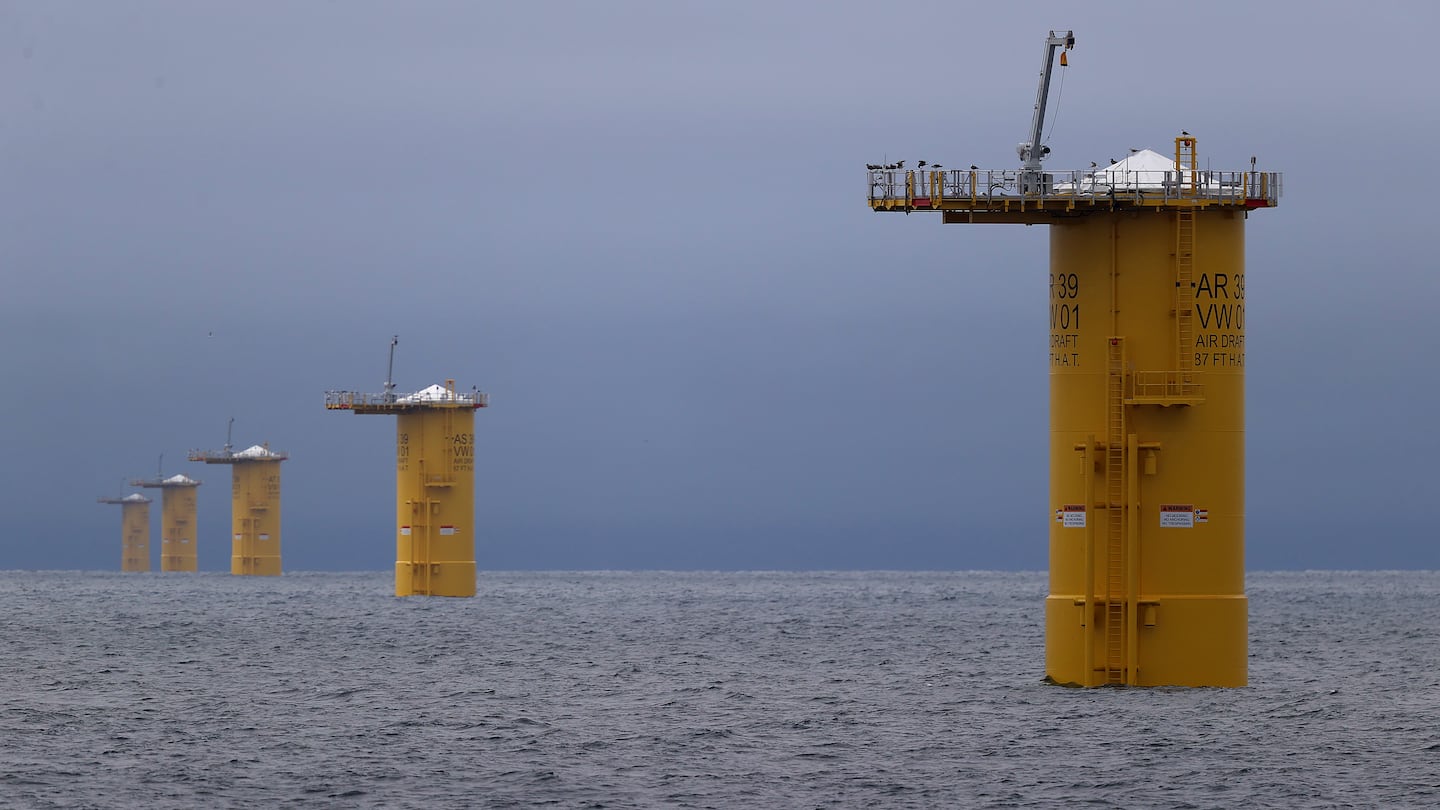 Pilings that serve as the base of offshore wind turbines in waters south of Martha's Vineyard last year. Contracts for the second wave of wind farms off the New England coast were awarded Friday.