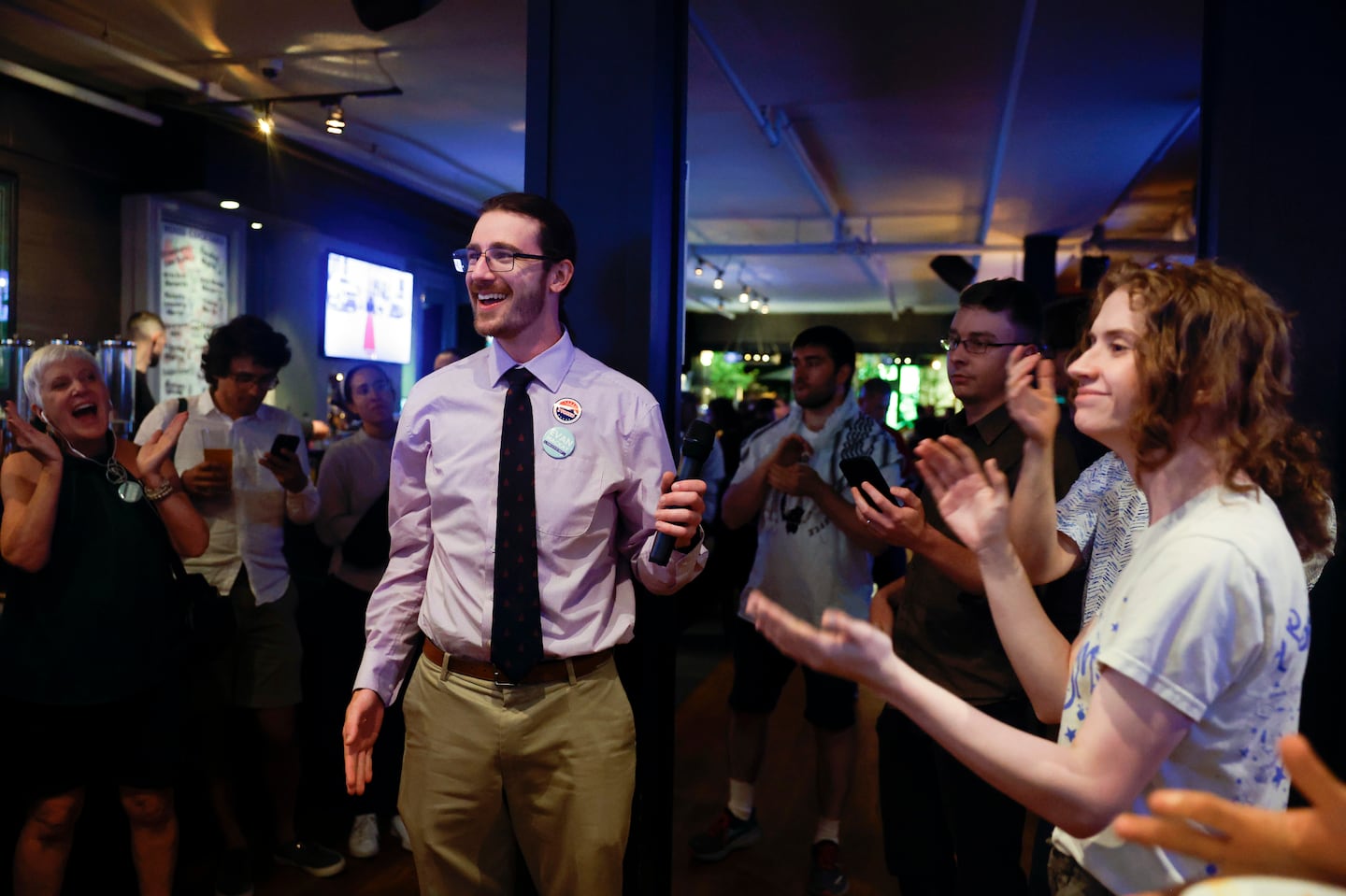 Evan MacKay addressed volunteers during their election night party in Cambridge on Tuesday.