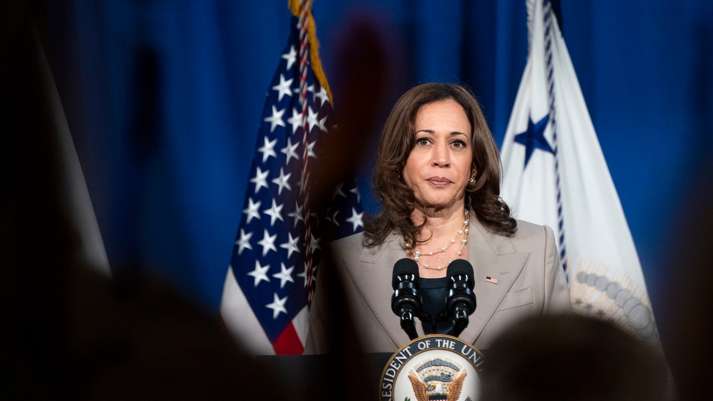 People applauded as Vice President Kamala Harris announced the cancelation of all federal student loans borrowed to attend any Corinthian College school on June 2, 2022.