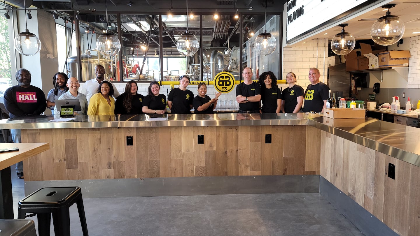 The team behind Brockton Beer Company was photographed as the taproom prepared to open in Brockton in 2022.