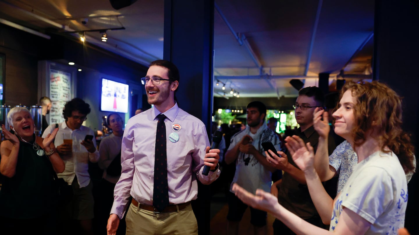 Evan MacKay addressed volunteers during their election night party in Cambridge on Tuesday.