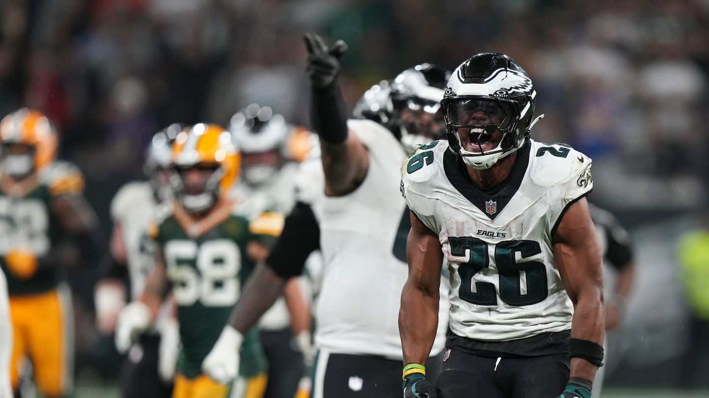 New Eagles running back Saquon Barkley (26) was pretty pumped up after scoring three touchdowns in his Philadelphia debut Friday night in Brazil.