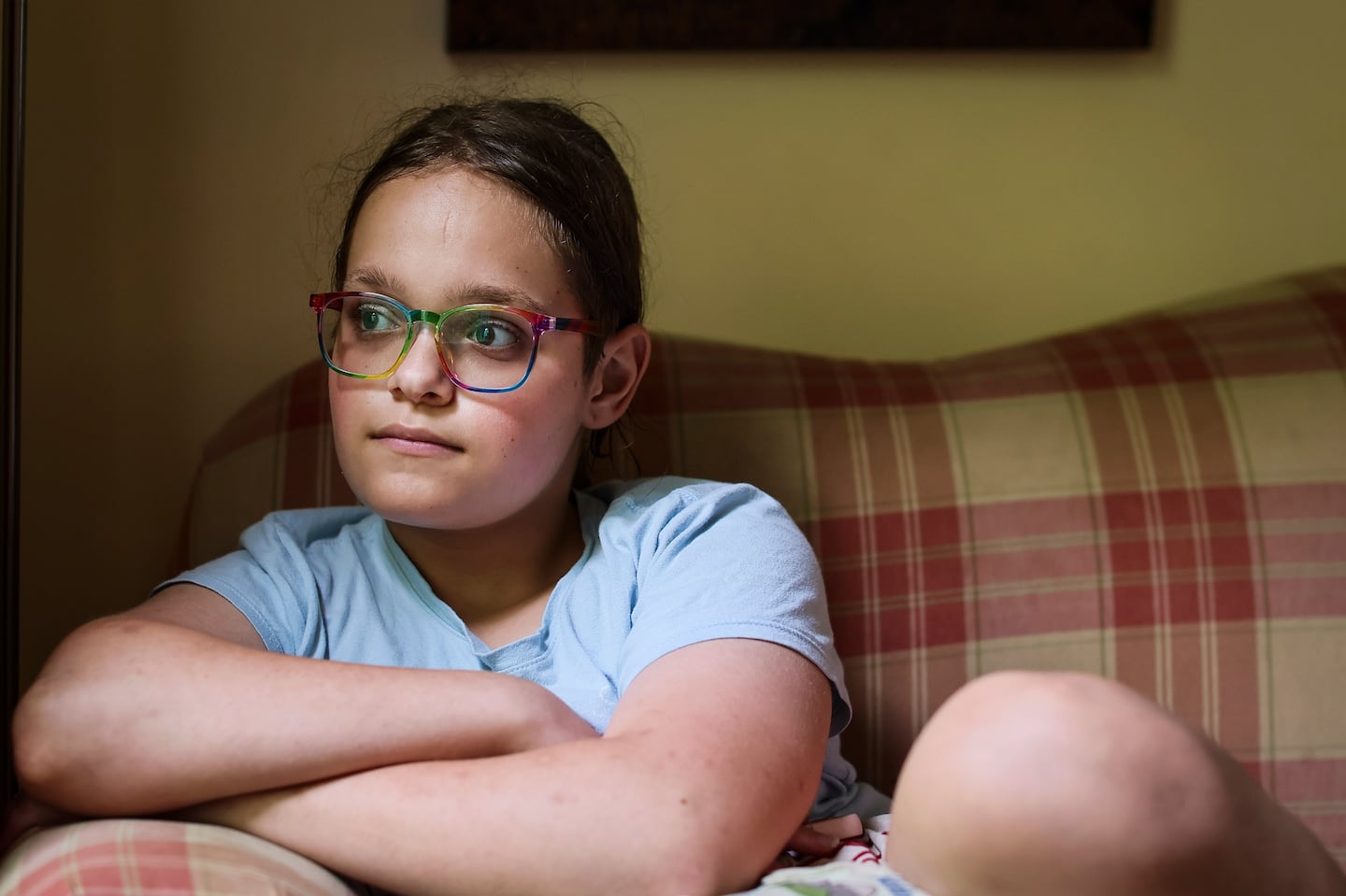 Iris Turmelle poses for a portrait at her home in Pembroke, N.H. Turmelle,14, has become an outspoken advocate, fighting against anti-LGBTQ legislation in New Hampshire.