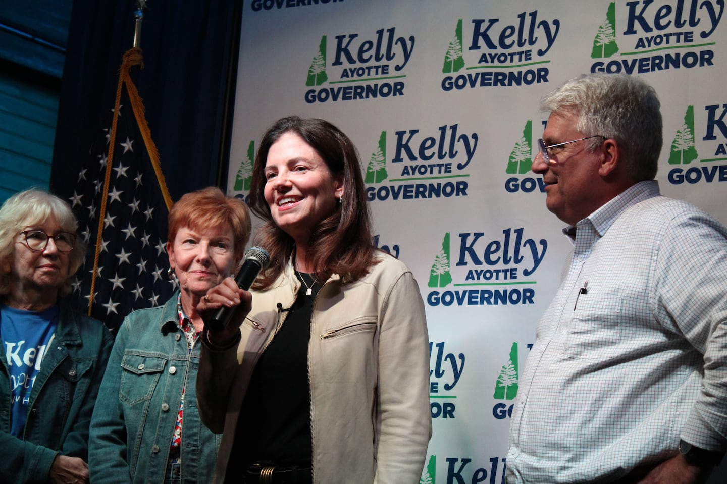 Kelly Ayotte, joined by her husband and other family members, delivers her victory speech at the Bonfire Restaurant & Country Bar in Manchester, N.H., after winning the GOP primary for New Hampshire governor on Tuesday.