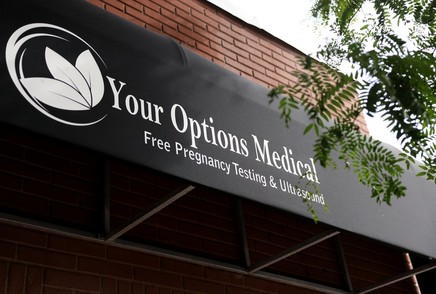 The awning outside of Your Options Medical in Revere in 2022. Crisis pregnancy centers are trying to beat back the criticism they’re facing from Governor Maura Healey and other state officials.