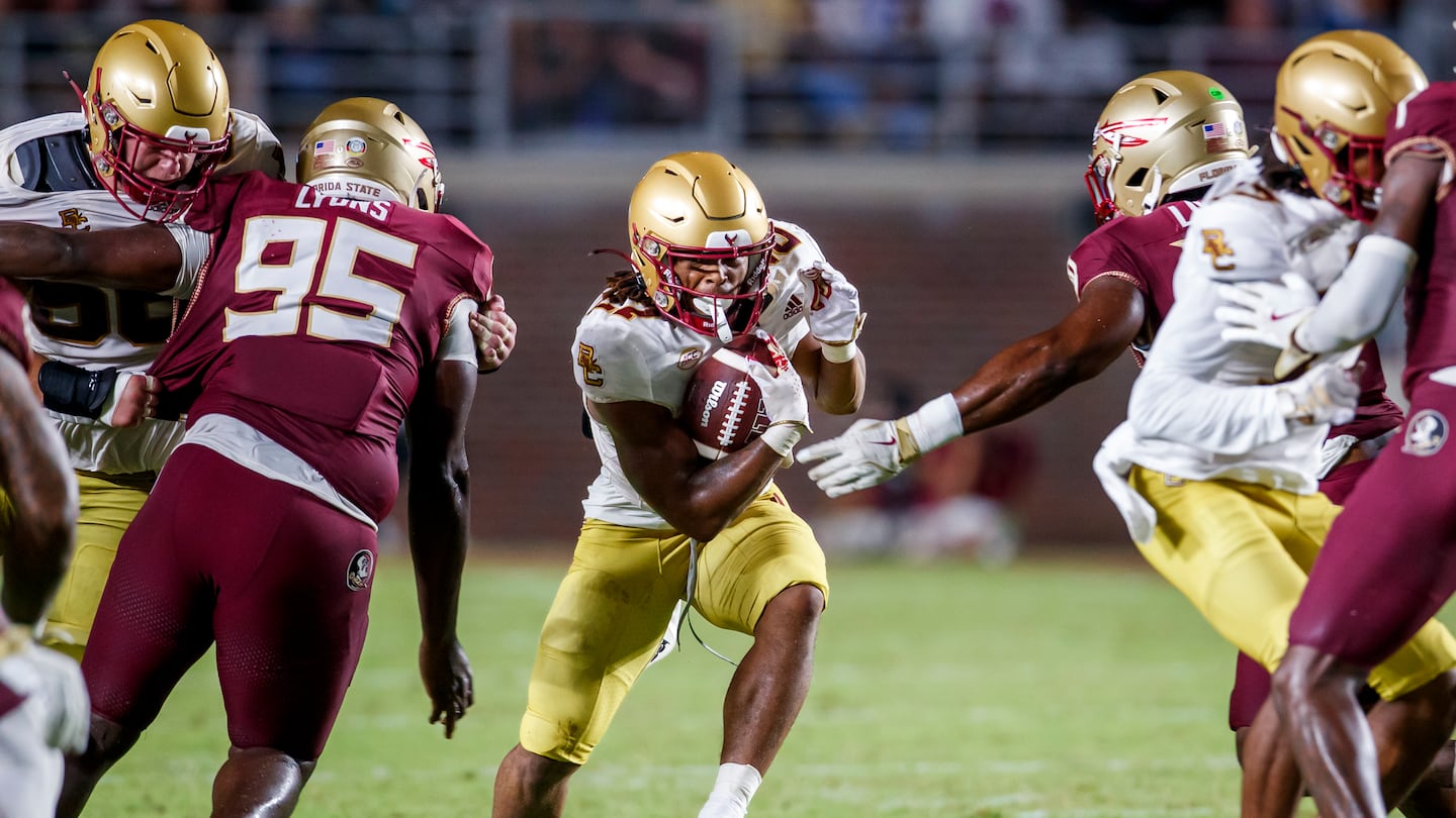 BC running back Turbo Richard headed for a gap as he picked up yardage in the upset of Florida State Sept. 2.