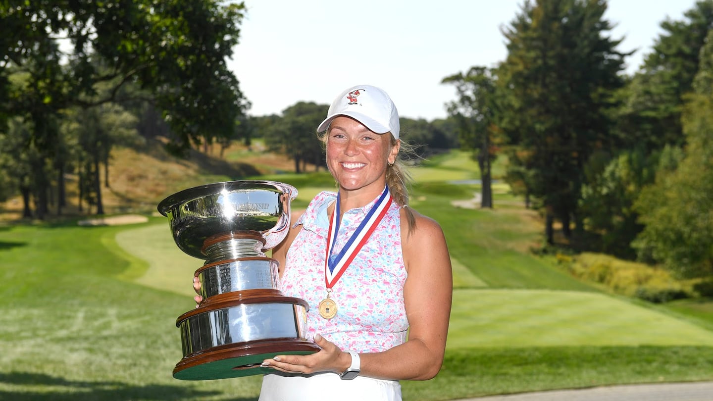 Hana Ryskova holds the Mildred Gardner Prunaret Trophy after winning the final match at the 2024 US Women's Mid-Amateur at Brae Burn Country Club in West Newton.