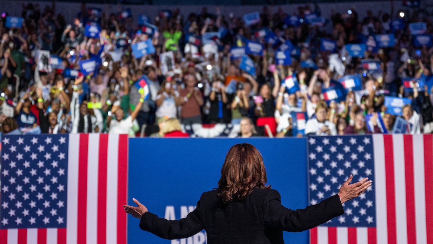 Vice President Kamala Harris gestured as she walked on stage to speak at a campaign rally Thursday at the Bojangles Coliseum in Charlotte.