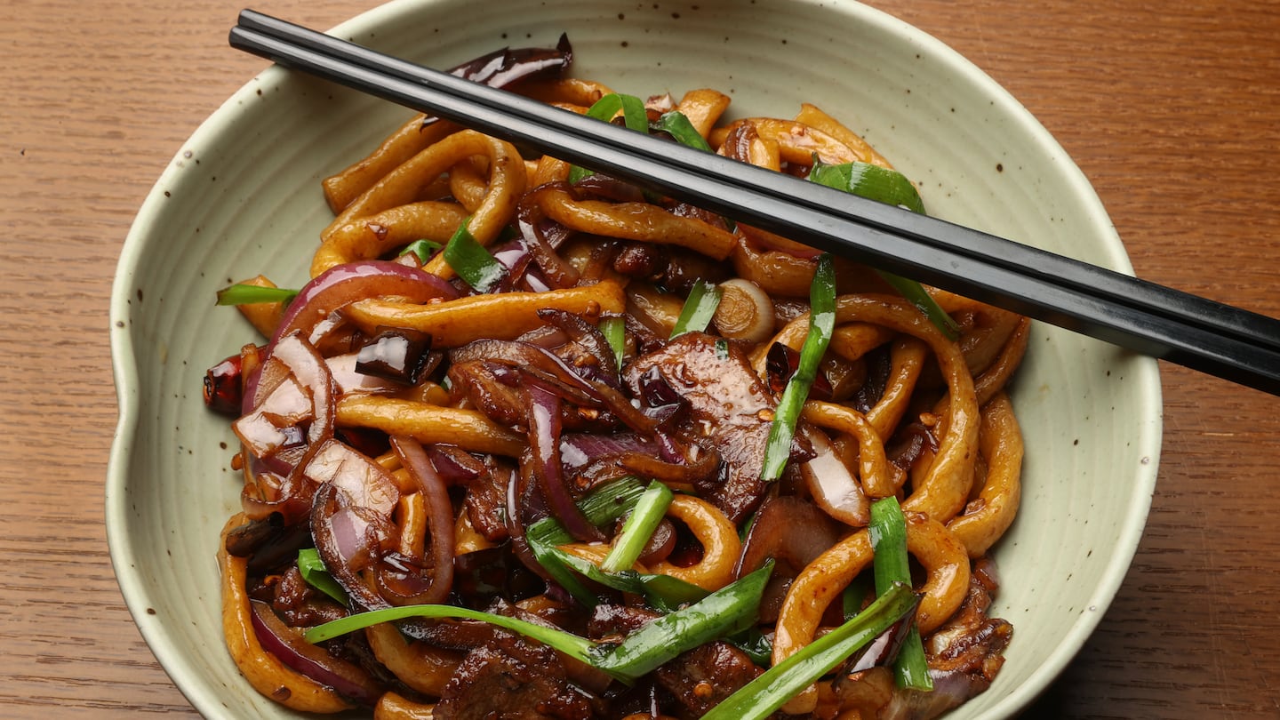 The Jahunger noodles, hand-pulled and tossed with beef, onions, chiles, and chives.