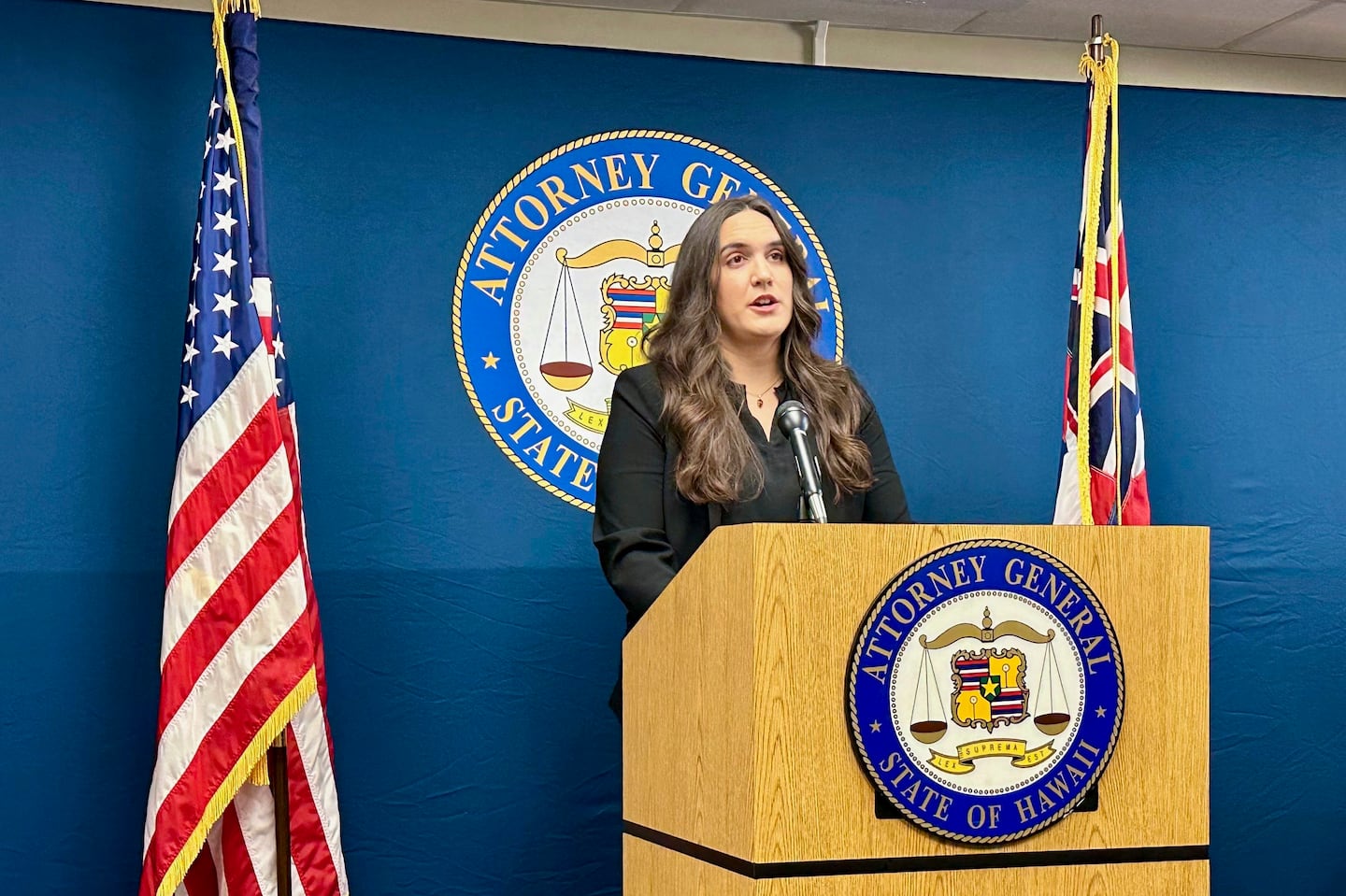 Hawaii Deputy Attorney General Ciara Kahahane, who grew up in Lahaina, discusses a wildfire investigation during a news conference in Honolulu on Sept. 13.