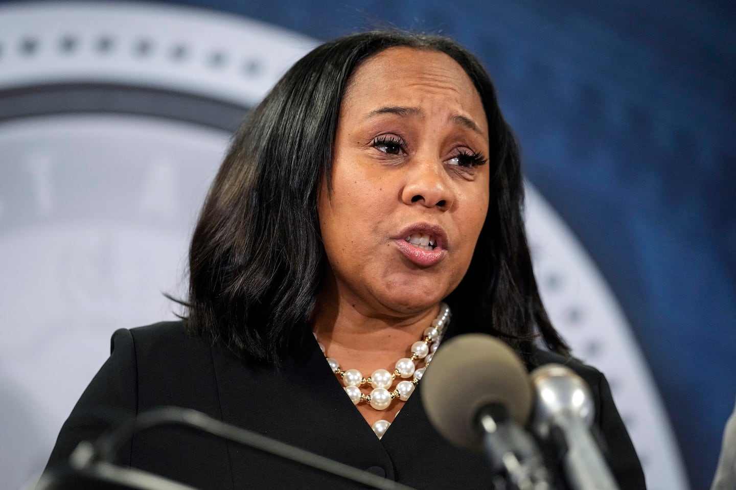 Fulton County District Attorney Fani Willis speaks during a news conference, Aug. 14, 2023, in Atlanta.