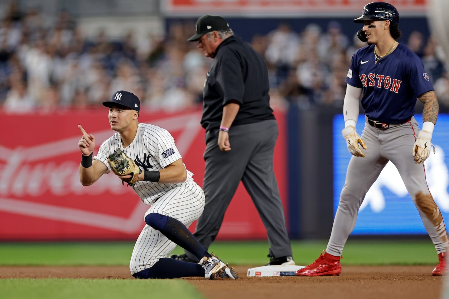 Take your pick for young star, Yankees shortstop Anthony Volpe (left) or Red Sox outfielder Jarren Duran.