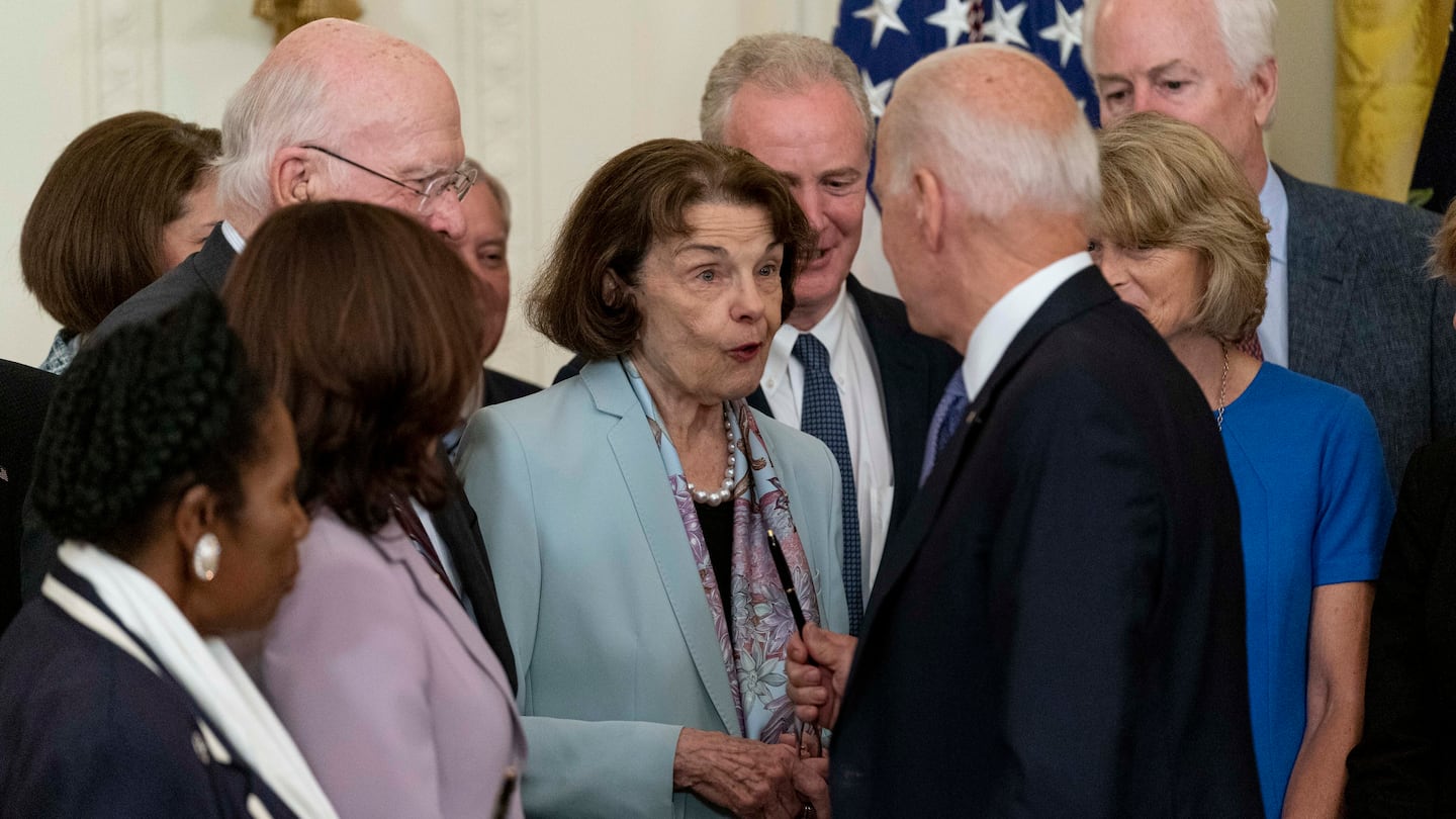 Senator Dianne Feinstein (center) and President Biden at a signing ceremony in the East Room of the White House on July 22, 2021. Feinstein, who served as senator from California for more than 30 years, died Sept. 29, 2023.