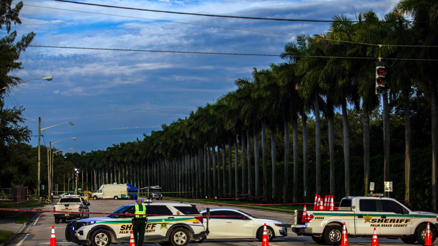 A police roadblock outside the Trump International Golf Club in West Palm Beach, Fla., on Monday morning.