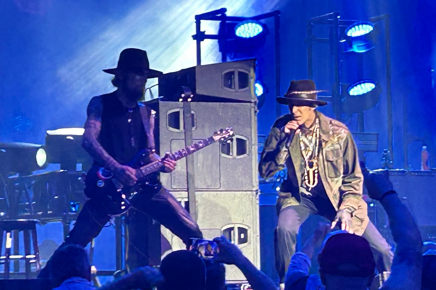 Dave Navarro ( left ) and Perry Farrell during the Jane's Addiction concert at the Leader Bank Pavilion on Friday. The show ended early after Farrell threw a punch at Navarro.