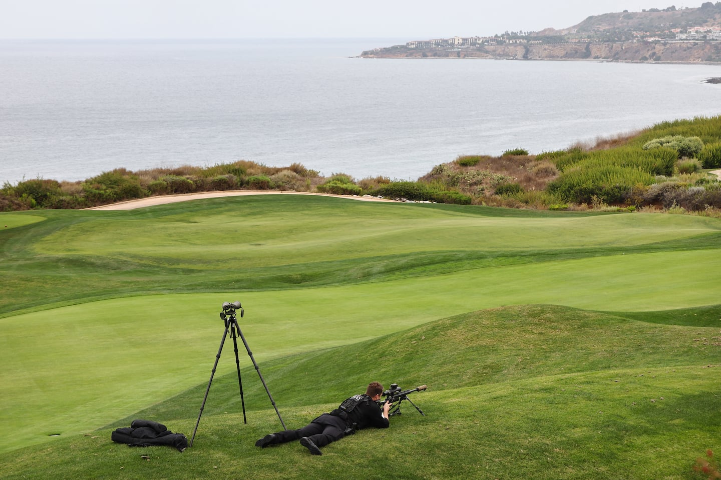 A Secret Service agent monitored the area before Republican presidential nominee Donald Trump arrived at a press conference at Trump National Golf Club Los Angeles on Sept. 13 in Rancho Palos Verdes, Calif.