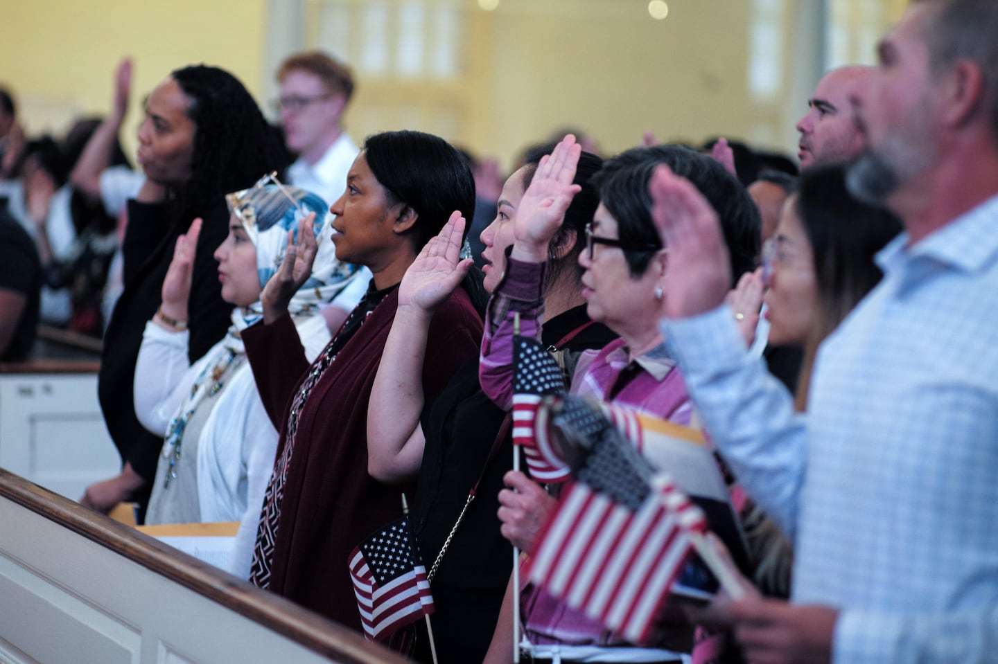 US Citizenship and Immigration Services presented 100 candidates for a naturalization Ceremony at the Old South Meeting House in Boston. Magistrate Judge Marianne B. Bowler of the United States District Court for the District of Massachusetts presided over the judicial ceremony.