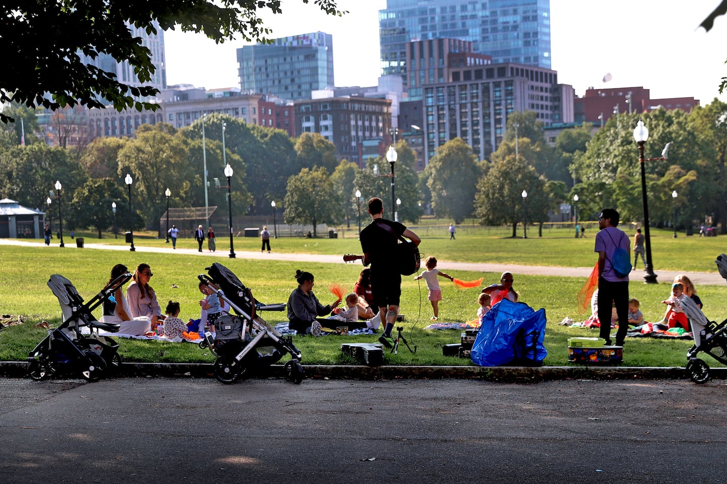 No problem for parking at this music concert on the Boston Common Tuesday morning. Baby strollers were lined up with parents and children enjoying the tunes amid another nice, sunny day.