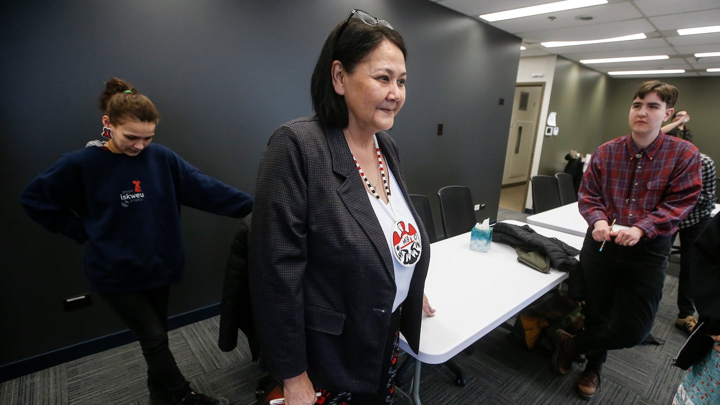 Ms. Merrick (center) joined Cambria Harris (left), daughter of Morgan Harris, who is believed to be buried in a landfill outside Winnipeg, at a press conference in Winnipeg in March.