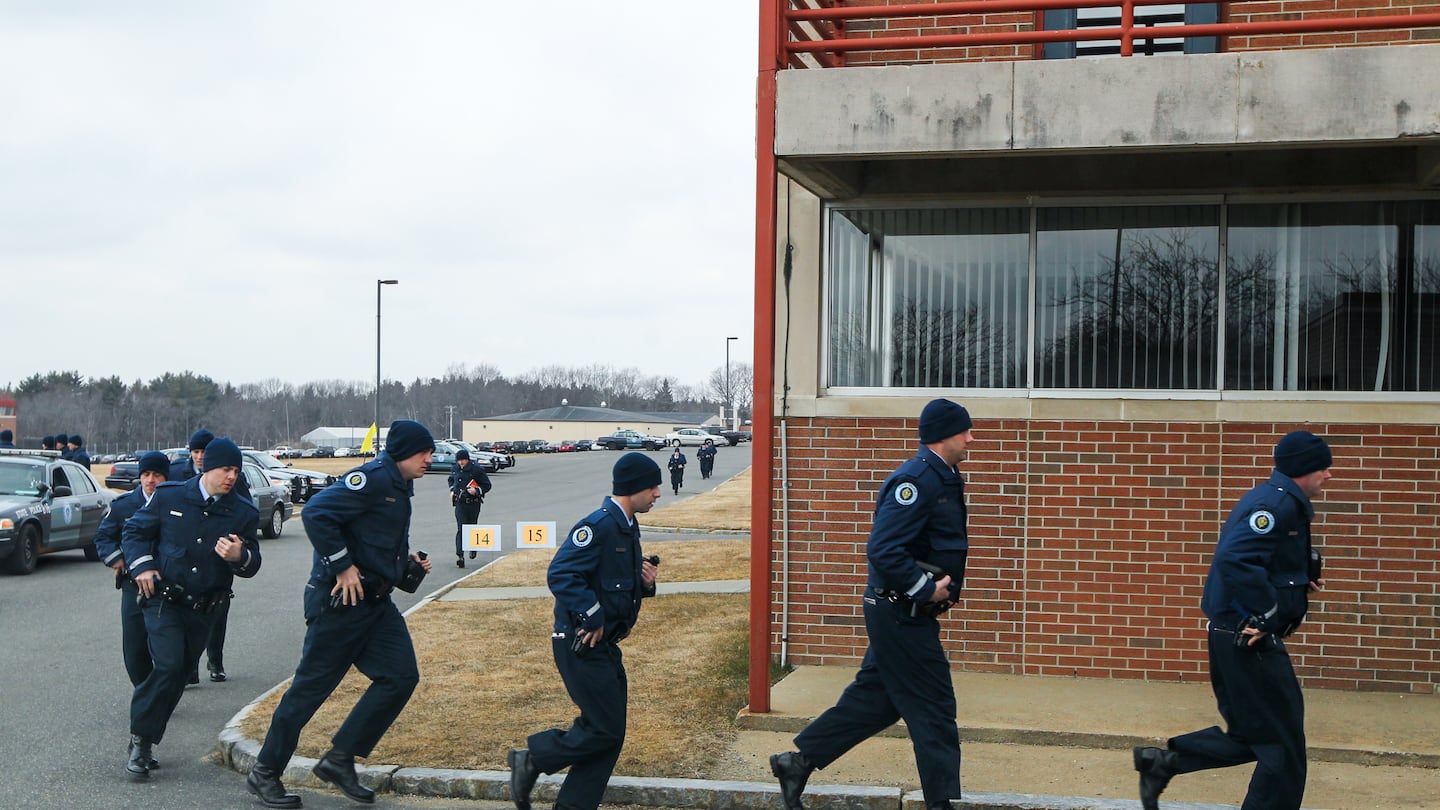 State Police trainees turned the corner of a building at the Massachusetts State Police Complex in New Braintree in 2012.